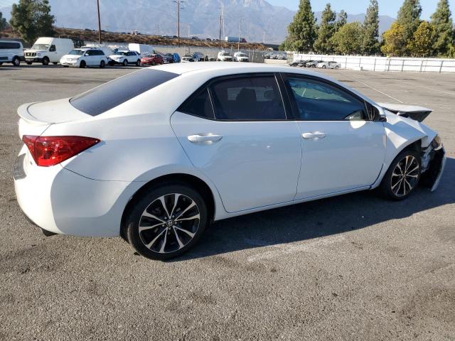 VIN 5YFBURHE9JP801759 2018 Toyota Corolla, L no.3