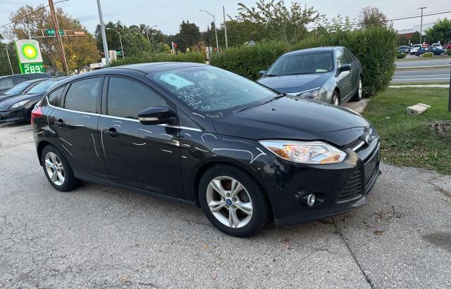 VIN 1FADP3N27DL352155 2013 Ford Focus, Titanium no.1