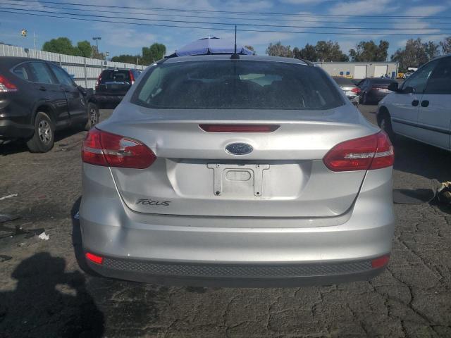 VIN 1FADP3E25JL211659 2018 Ford Focus, S no.6