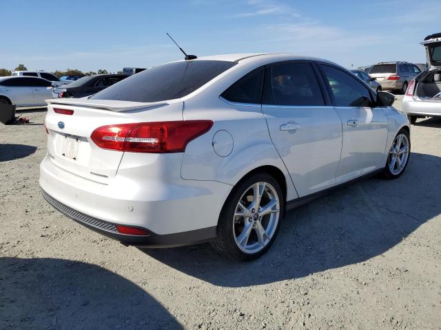 VIN 1FADP3J22GL227414 2016 Ford Focus, Titanium no.3