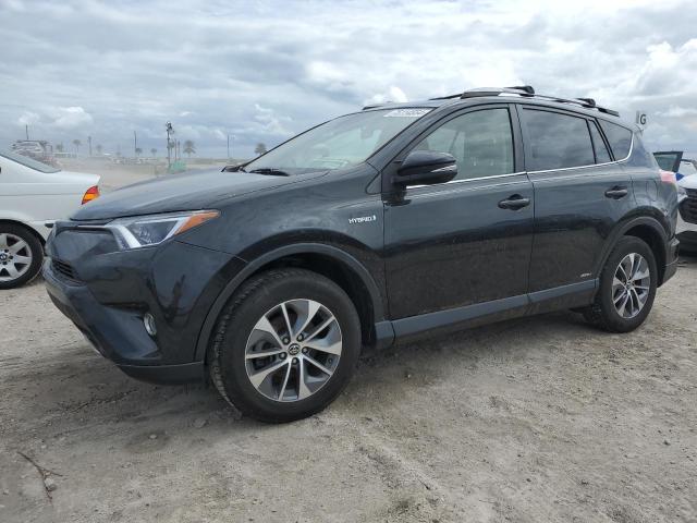 VIN JTMRJREV8JD186040 2018 Toyota RAV4, LE no.1