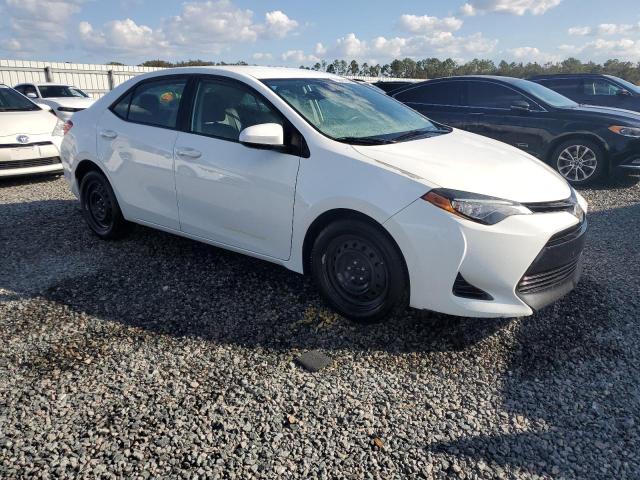 VIN 5YFBURHE2HP600439 2017 Toyota Corolla, L no.4