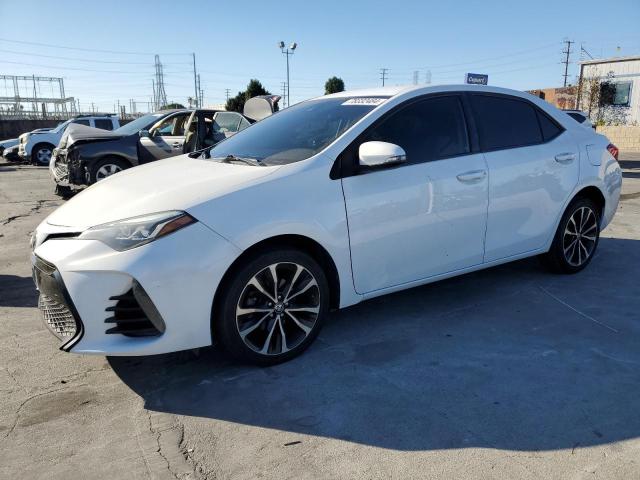 VIN 5YFBURHE8HP699459 2017 Toyota Corolla, L no.1