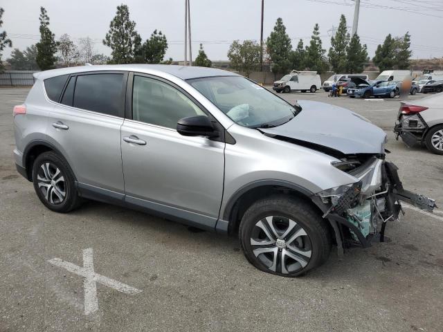 VIN JTMZFREV9JJ179035 2018 Toyota RAV4, LE no.4