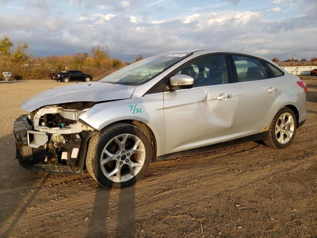 VIN 1FADP3J21EL404581 2014 Ford Focus, Titanium no.1