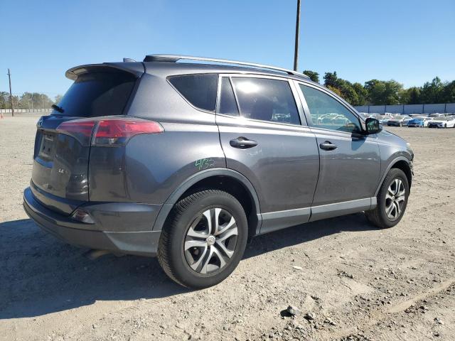 VIN JTMZFREV7HJ128532 2017 Toyota RAV4, LE no.3