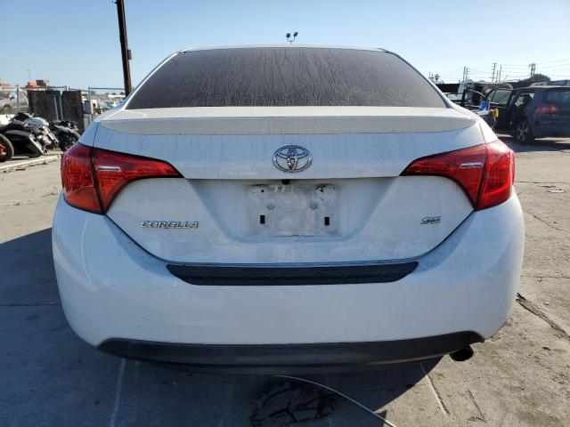 VIN 5YFBURHE8HP699459 2017 Toyota Corolla, L no.6