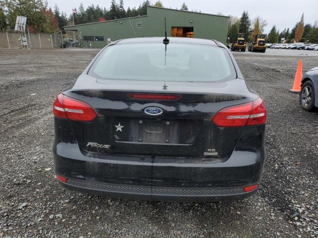 VIN 1FADP3FE8JL246902 2018 Ford Focus, SE no.6