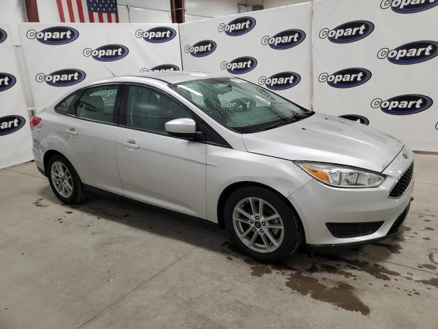 VIN 1FADP3F26JL297501 2018 Ford Focus, SE no.4