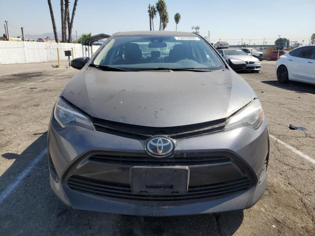 VIN 5YFBURHE9HP584255 2017 Toyota Corolla, L no.5