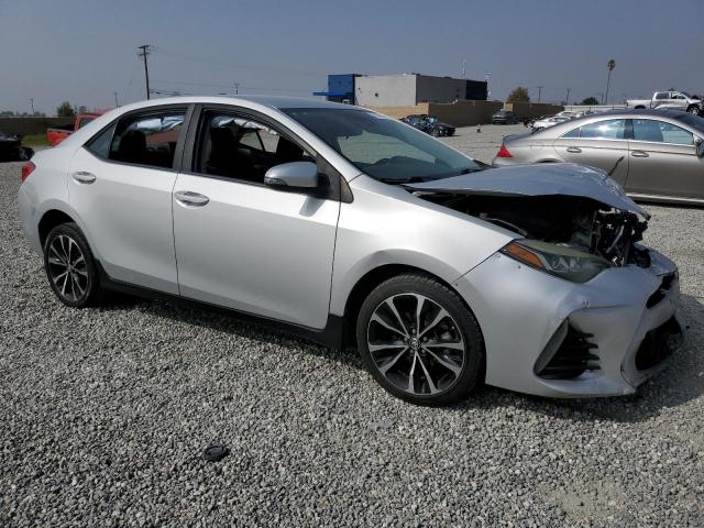 VIN 5YFBURHE5HP615291 2017 Toyota Corolla, L no.4