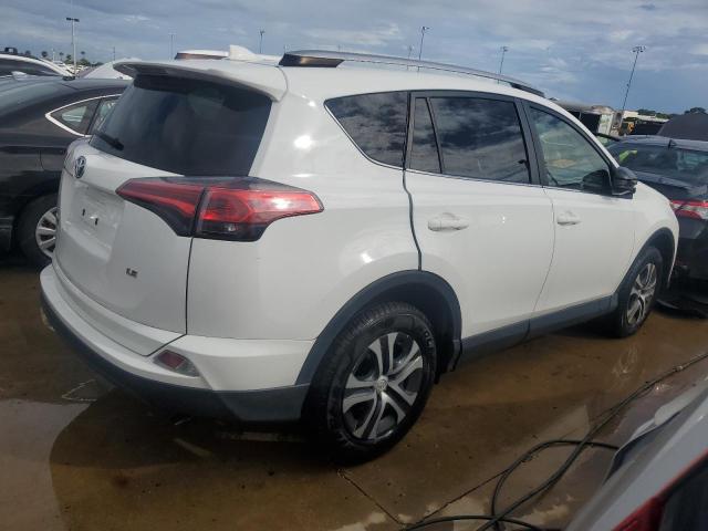 VIN JTMZFREV6JJ206806 2018 Toyota RAV4, LE no.3