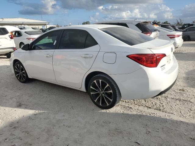 VIN 5YFBURHE2JP824509 2018 Toyota Corolla, L no.2