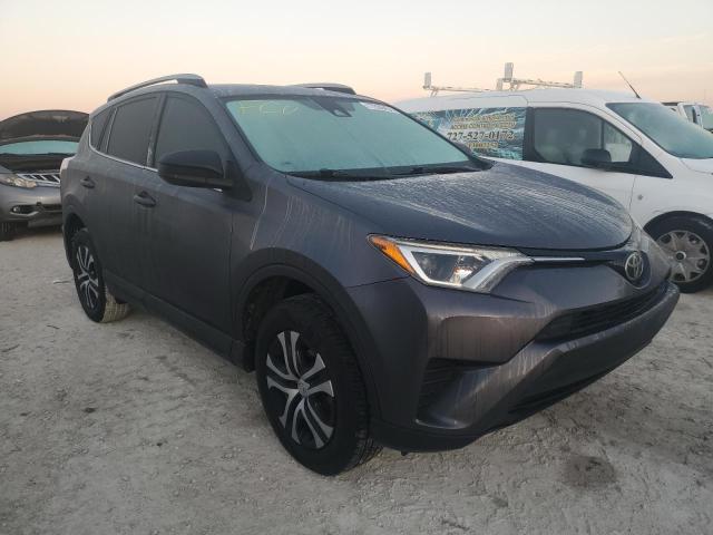 VIN JTMZFREV2JJ725531 2018 Toyota RAV4, LE no.4