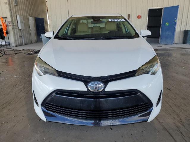 VIN 5YFBURHE4JP746587 2018 Toyota Corolla, L no.5