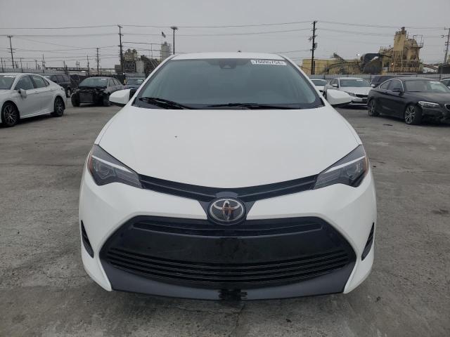 VIN 5YFBURHE8JP822098 2018 Toyota Corolla, L no.5