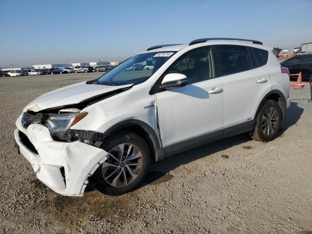 2018 TOYOTA RAV4 HV LE - JTMRJREV3JD189587