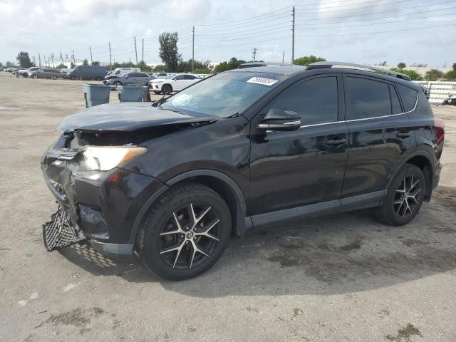 VIN 2T3JFREV1JW723879 2018 Toyota RAV4, SE no.1