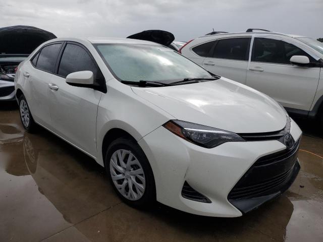 VIN 5YFBURHE4KP880100 2019 Toyota Corolla, L no.4