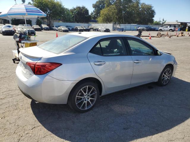 VIN 5YFBURHE7HP623697 2017 Toyota Corolla, L no.3