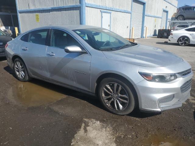 VIN 1G1ZE5ST9HF138537 2017 Chevrolet Malibu, LT no.4