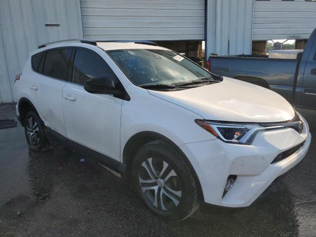 VIN JTMZFREV3HJ704682 2017 Toyota RAV4, LE no.4