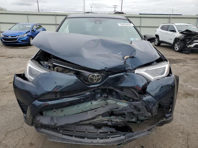 VIN JTMBFREV6JJ731706 2018 Toyota RAV4, LE no.5