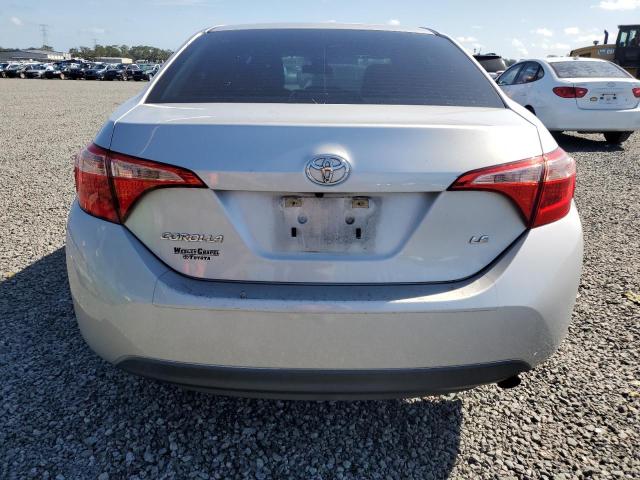 VIN 5YFBURHE7HP735772 2017 Toyota Corolla, L no.6