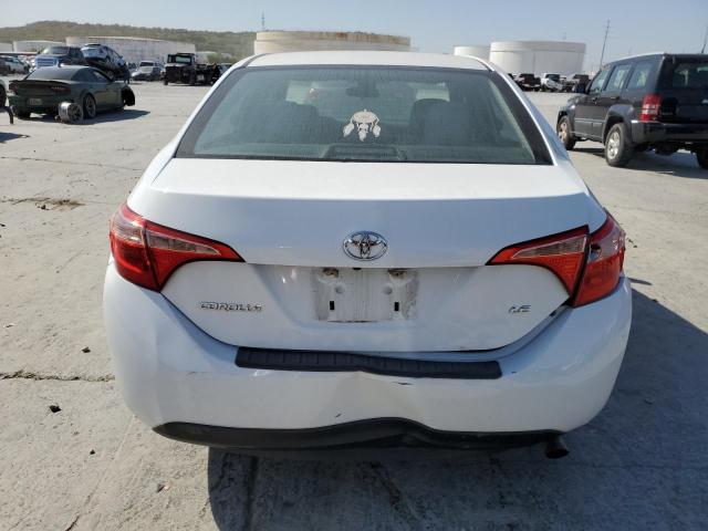 VIN 5YFBURHE9JP817573 2018 Toyota Corolla, L no.6