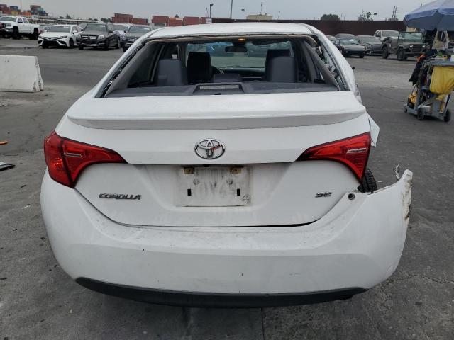 VIN 5YFBURHE1KP878997 2019 TOYOTA COROLLA no.6