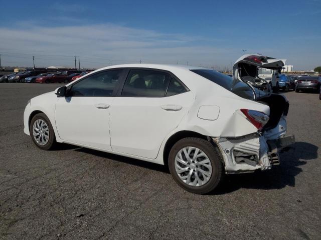 VIN 5YFBURHE8HP601126 2017 Toyota Corolla, L no.2