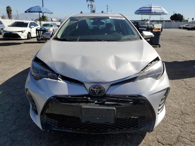 VIN 5YFBURHE7HP623697 2017 Toyota Corolla, L no.5