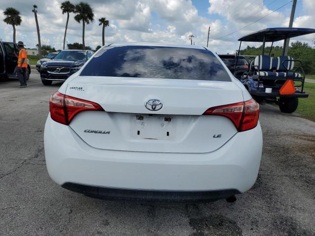 VIN 5YFBURHE3HP715308 2017 Toyota Corolla, L no.6