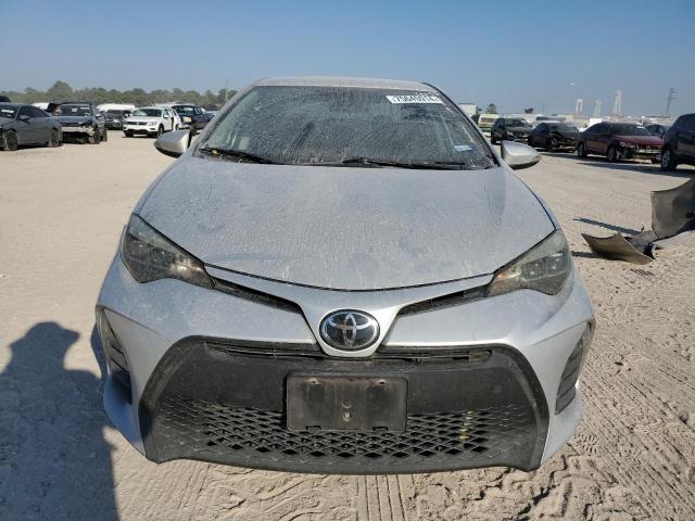 VIN 5YFBURHE0JP854057 2018 Toyota Corolla, L no.5