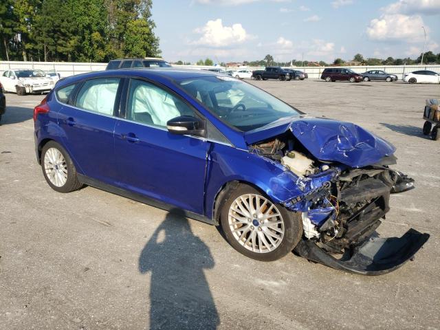 VIN 1FADP3N20EL209517 2014 Ford Focus, Titanium no.4