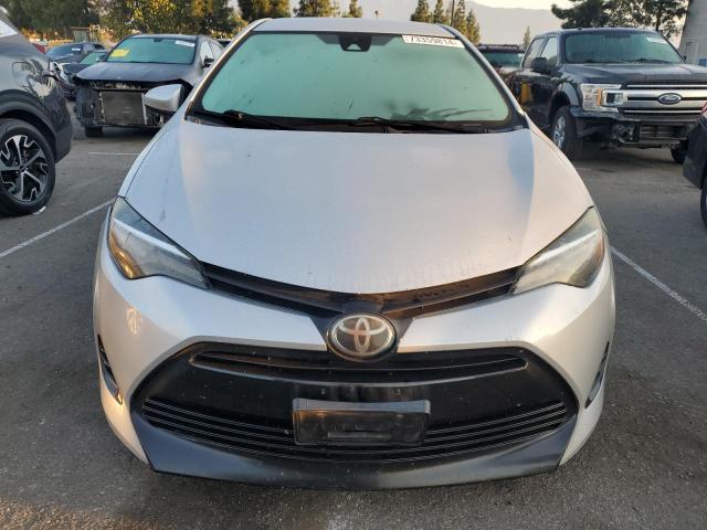 VIN 5YFBURHEXHP584295 2017 Toyota Corolla, L no.5