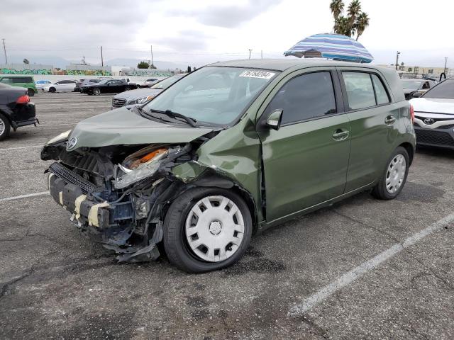 TOYOTA SCION XD 2010 green  gas JTKKU4B46A1000156 photo #1