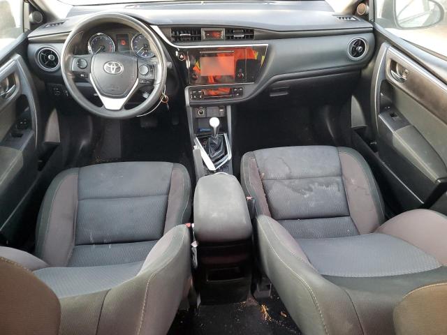 VIN 5YFBURHE2JP839446 2018 Toyota Corolla, L no.8