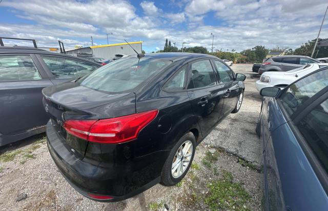 VIN 1FADP3F25HL220693 2017 Ford Focus, SE no.4