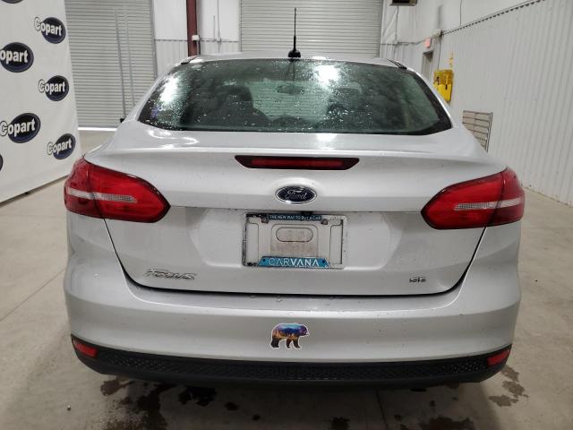 VIN 1FADP3F26JL297501 2018 Ford Focus, SE no.6