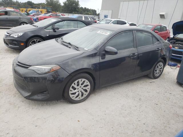 VIN 5YFBURHE5HP735057 2017 Toyota Corolla, L no.1