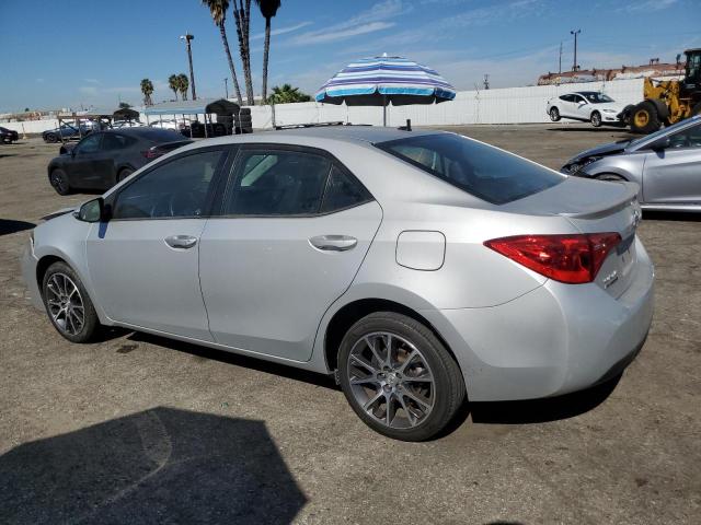 VIN 5YFBURHE7HP623697 2017 Toyota Corolla, L no.2