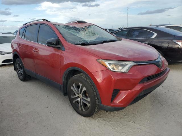 VIN JTMBFREV5HJ105557 2017 Toyota RAV4, LE no.4