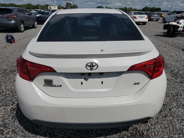 VIN 5YFBURHE9JP840982 2018 Toyota Corolla, L no.6