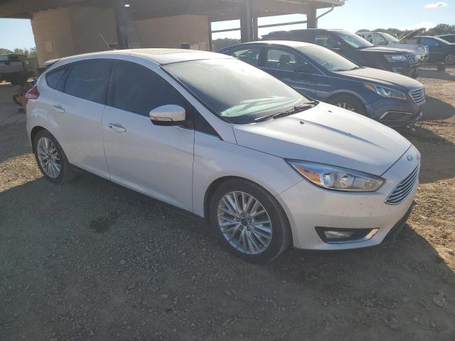 VIN 1FADP3N24FL372320 2015 Ford Focus, Titanium no.4