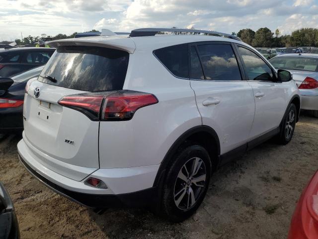 VIN JTMWFREV4HJ720330 2017 Toyota RAV4, Xle no.4