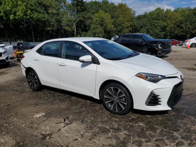 VIN 5YFBURHE2HP666747 2017 Toyota Corolla, L no.4