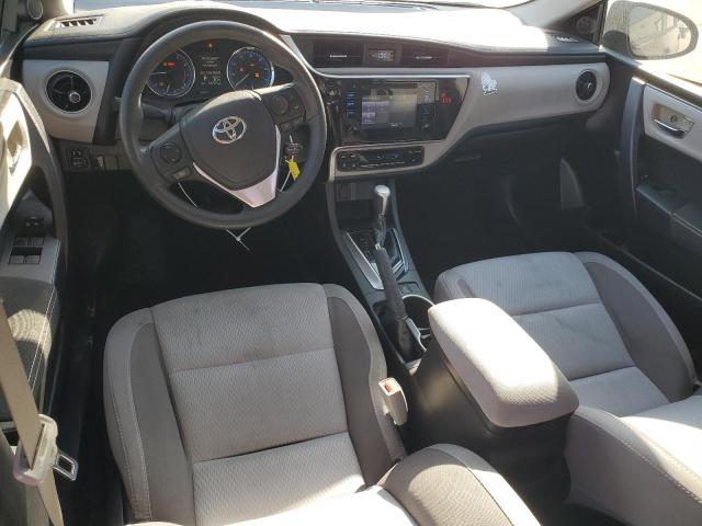 VIN 5YFBURHE2JP769219 2018 Toyota Corolla, L no.8