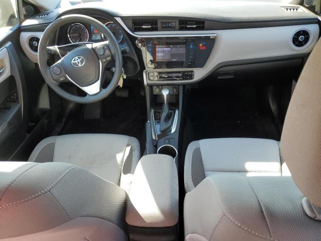 VIN 5YFBURHE0JP820071 2018 Toyota Corolla, L no.8