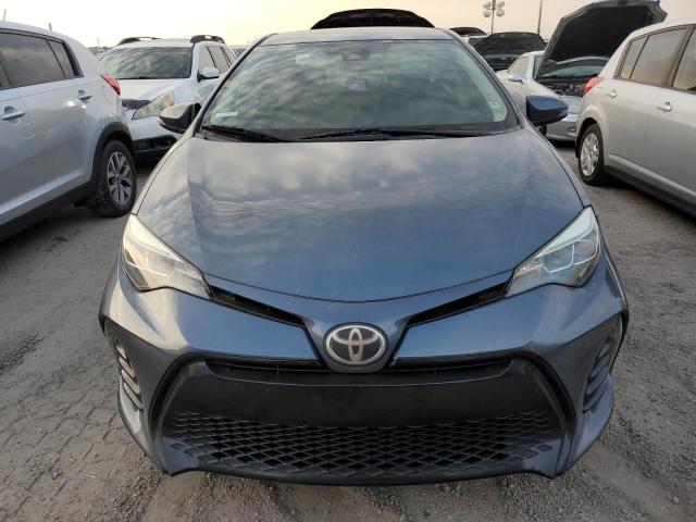 VIN 5YFBURHE4HP618621 2017 Toyota Corolla, L no.5